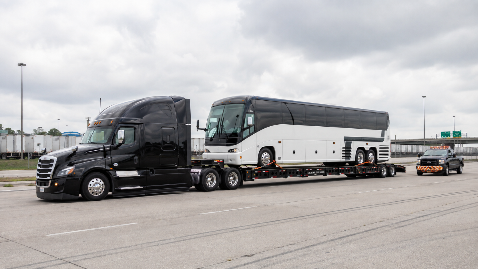 Commercial motorcoach secured for heavy transport